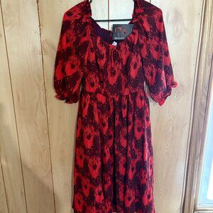 IT licensed swing dress with belt by Vixen by Micheline Pitt